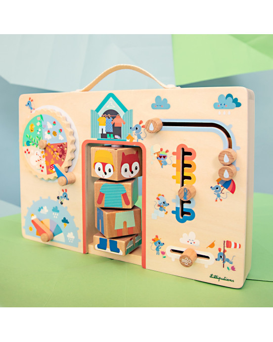 LILLIPUTIENS. Ξύλινο ταμπλό δραστηριοτήτων Το βαλιτσάκι της Alice